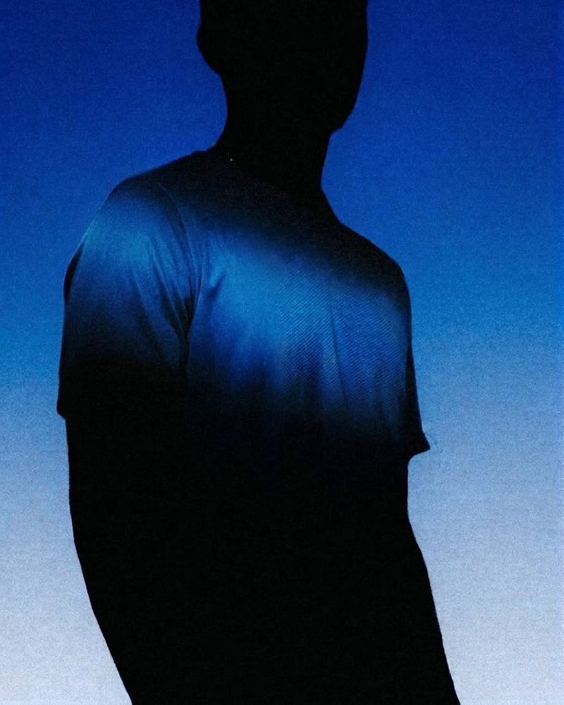 Silhouette teaser of the official race tee